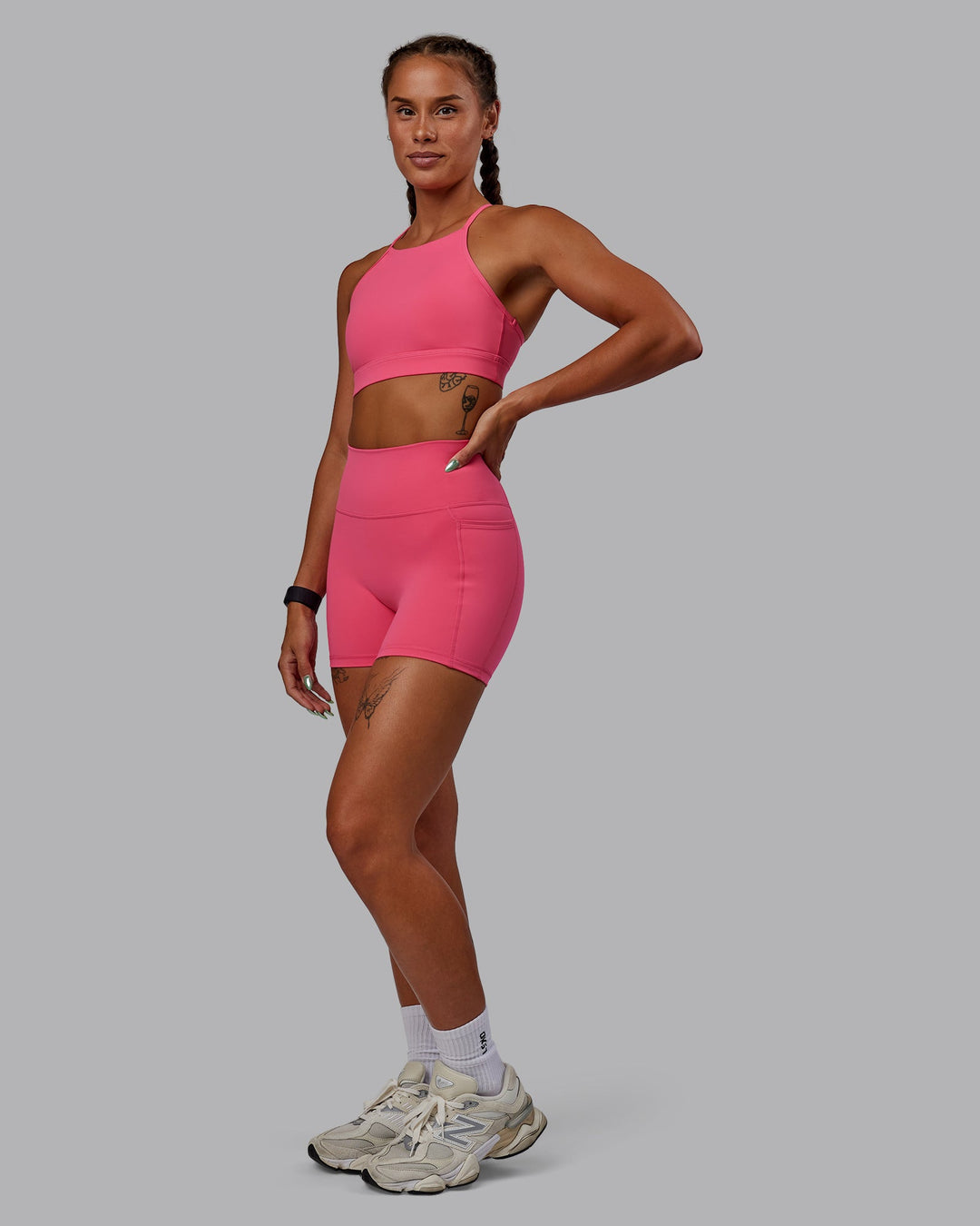 Woman wearing Lift High Neck Sports Bra - Hot Pink