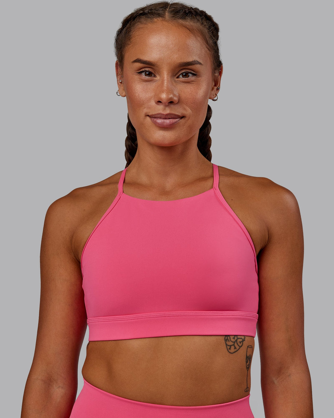 Woman wearing Lift High Neck Sports Bra - Hot Pink