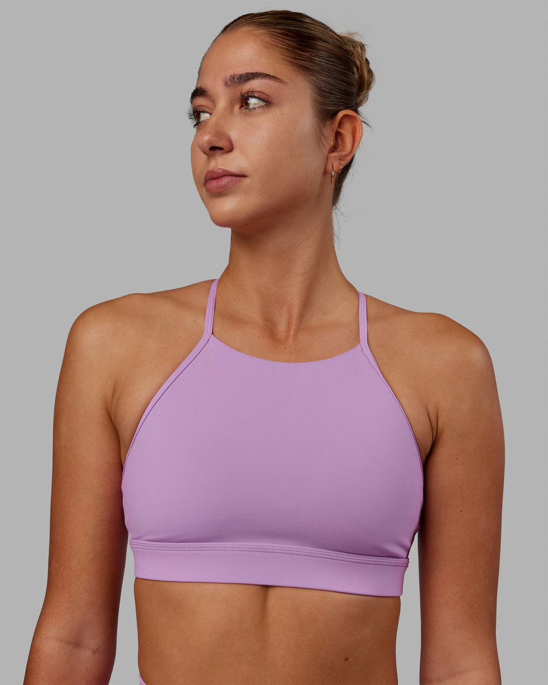 Woman wearing Lift High Neck Sports Bra - Light Violet