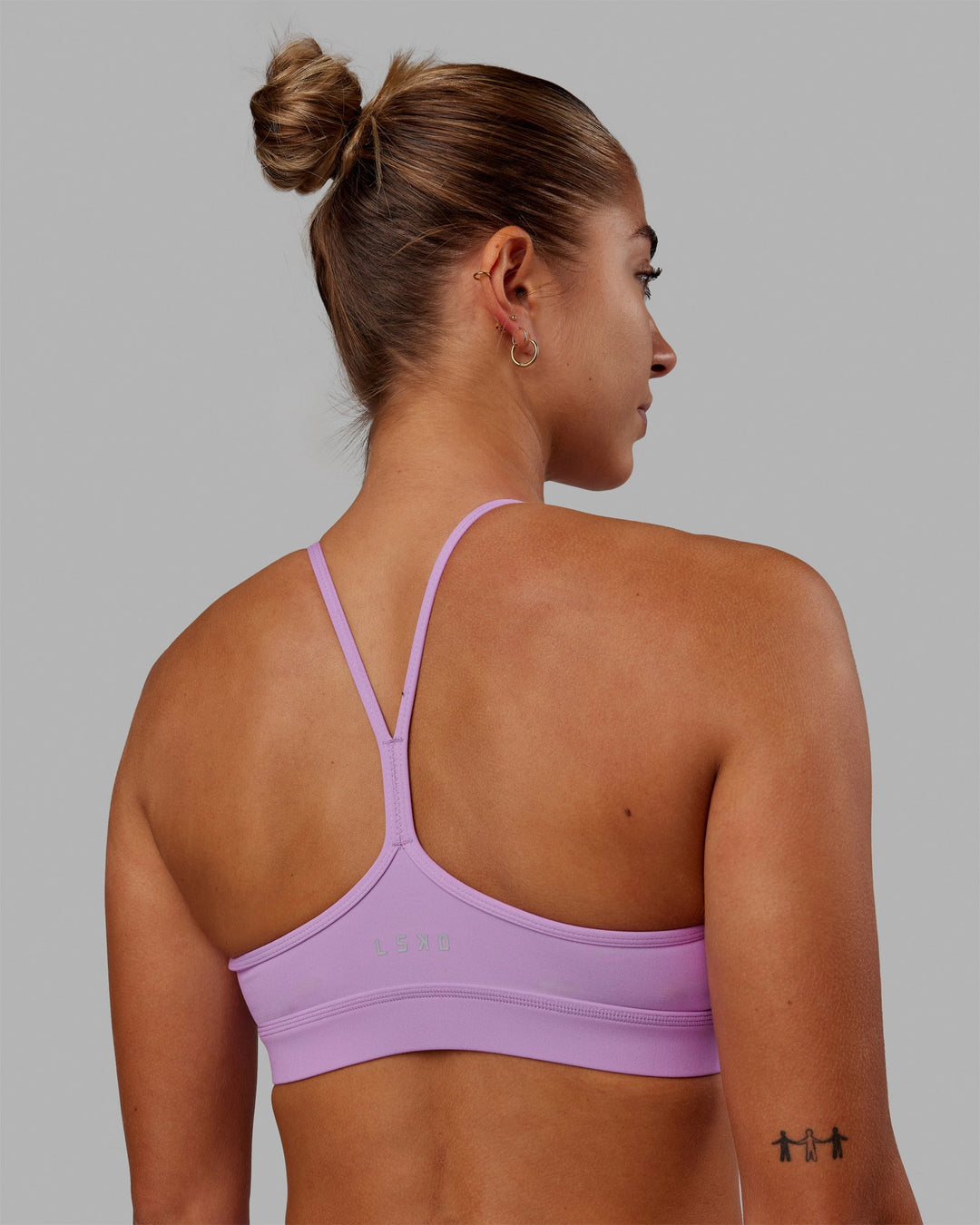 Woman wearing Lift High Neck Sports Bra - Light Violet