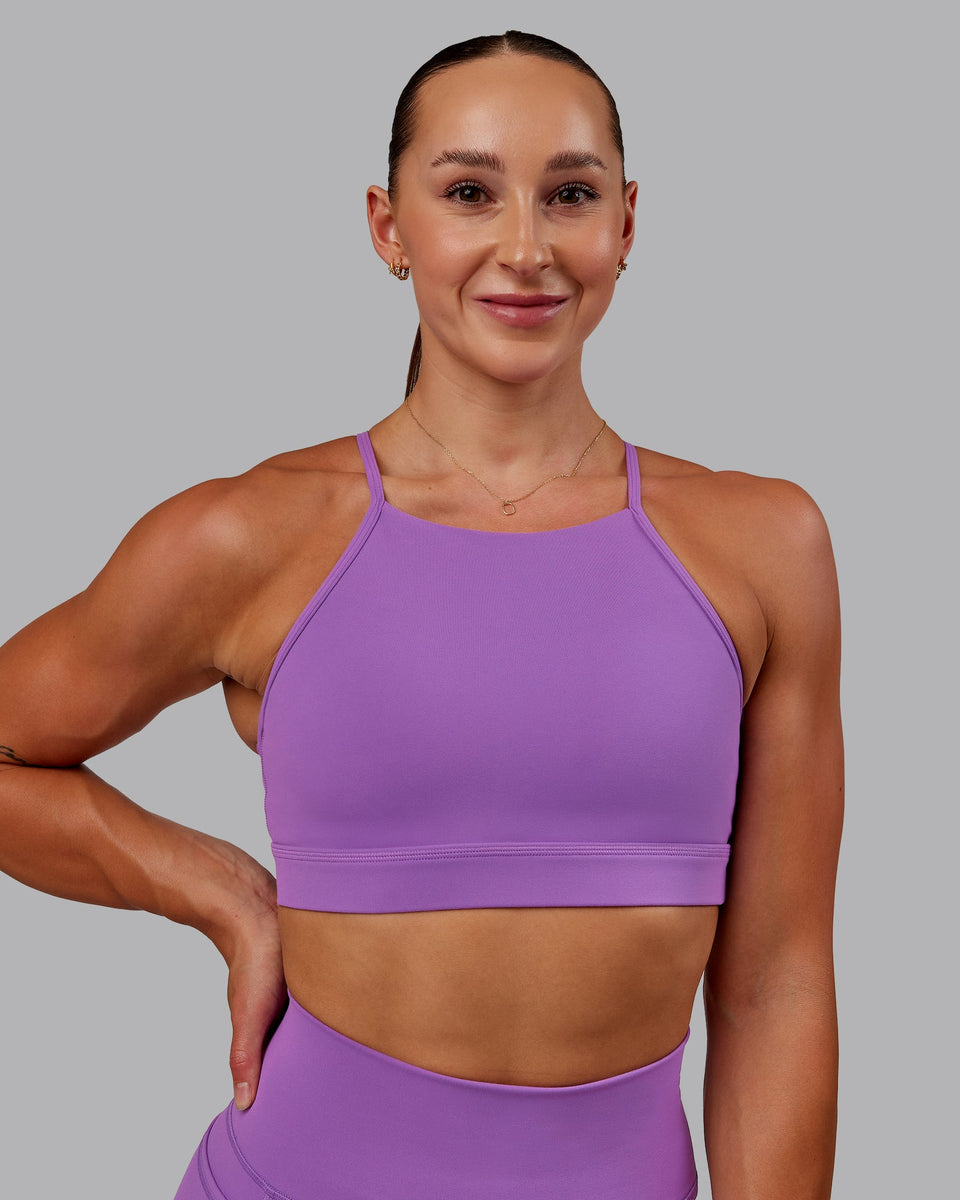 Woman wearing Lift High Neck Sports Bra - Purple Fizz