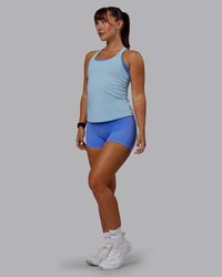 Woman wearing Lift Performance Tank - Glacial Blue | Thumbnail Index: 5