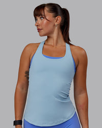 Woman wearing Lift Performance Tank - Glacial Blue | Thumbnail Index: 0