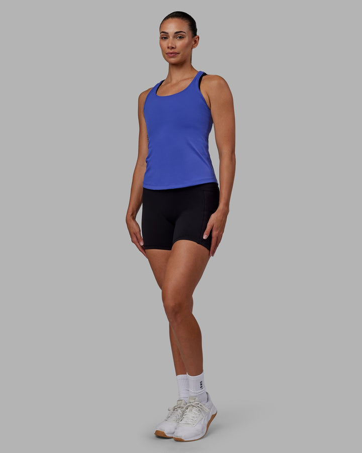 Woman wearing Lift Performance Tank - Power Cobalt
