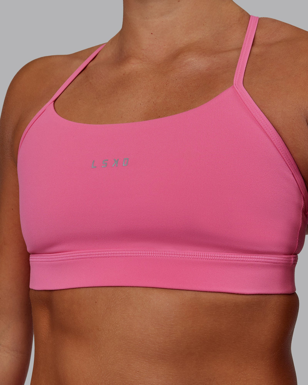 Woman wearing Lift Sports Bra - Carmine Rose