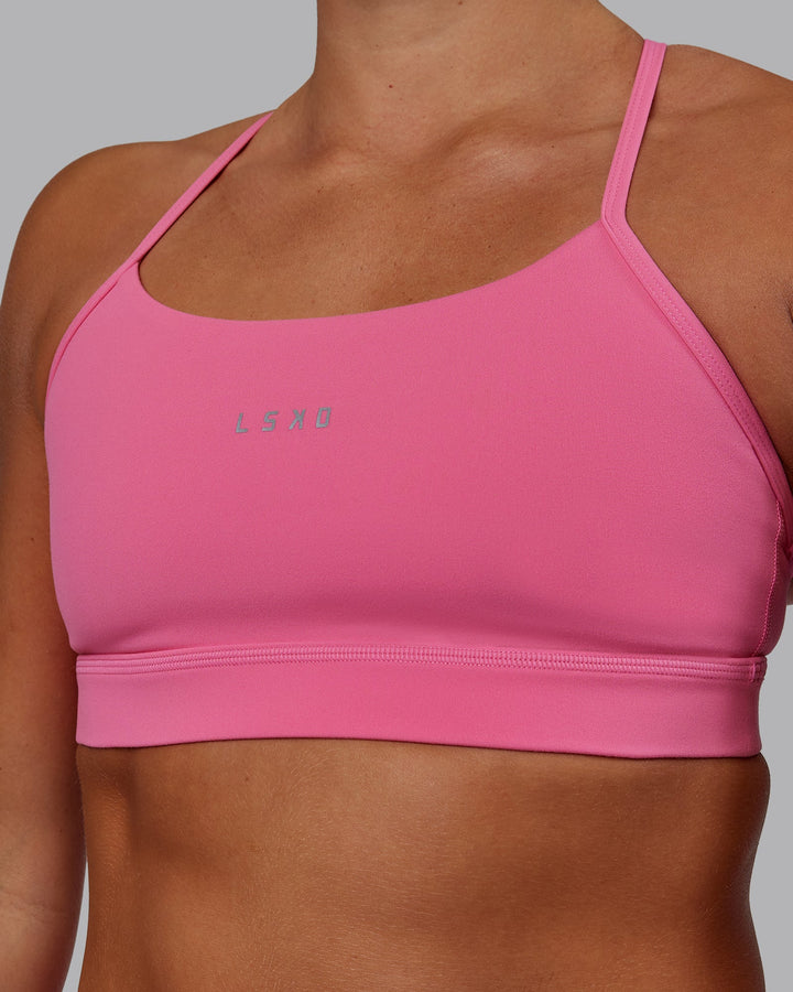 Woman wearing Lift Sports Bra - Carmine Rose
