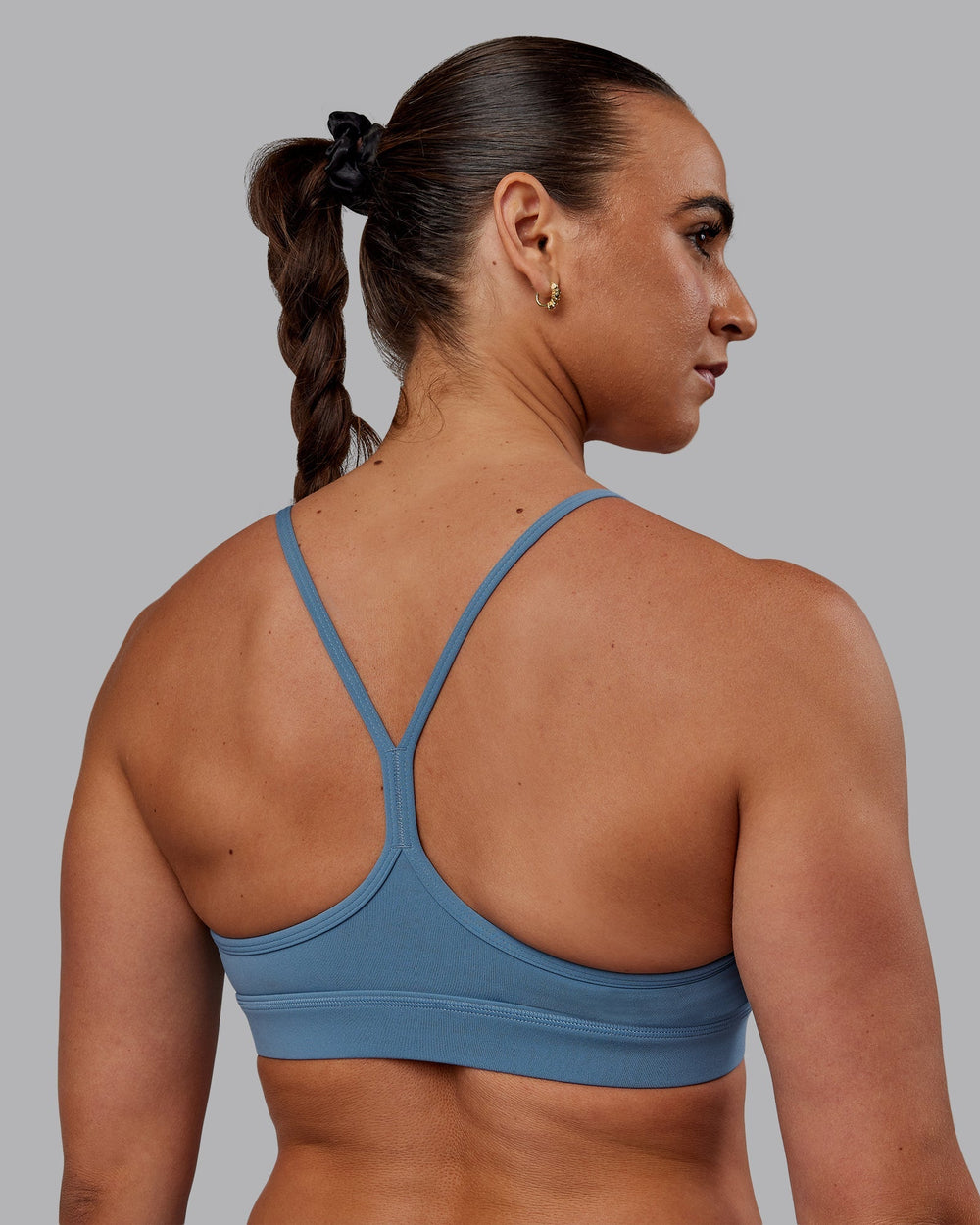 Woman wearing Lift Sports Bra - Elemental Blue