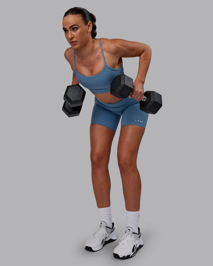 Woman wearing Lift Sports Bra - Elemental Blue
