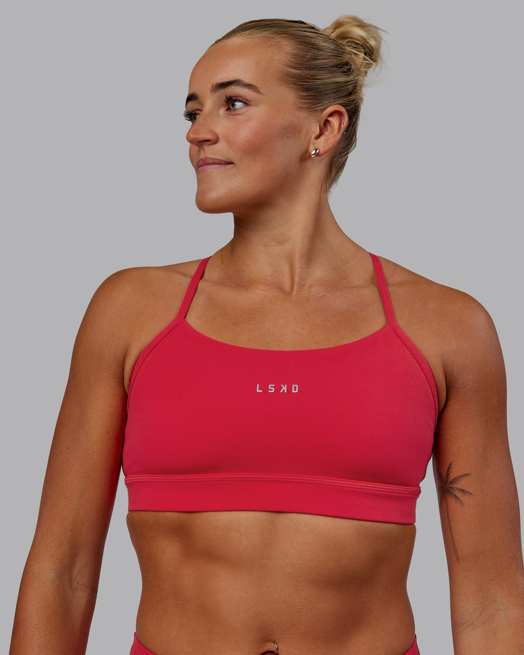 Woman wearing Lift Sports Bra - Scarlet