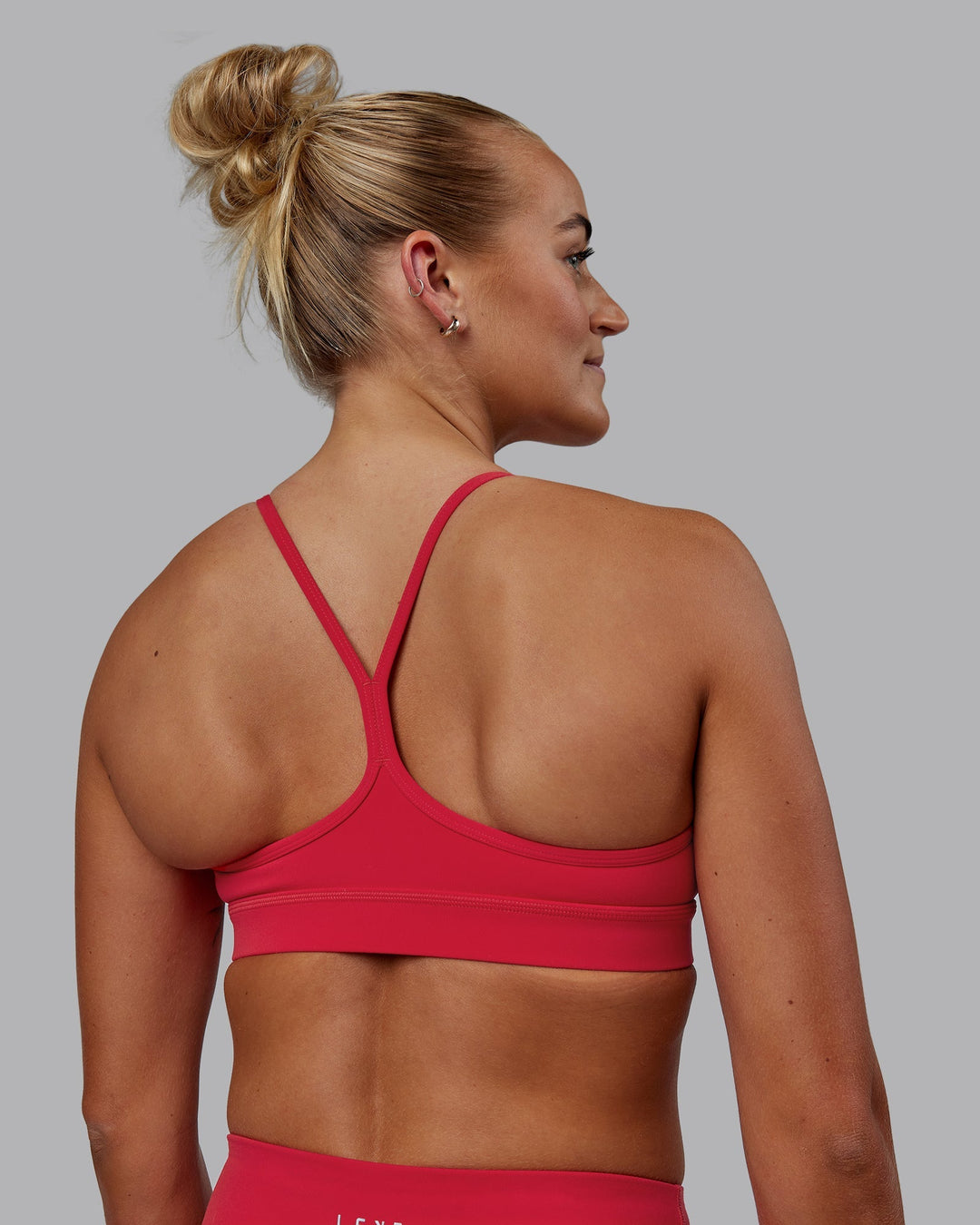 Woman wearing Lift Sports Bra - Scarlet