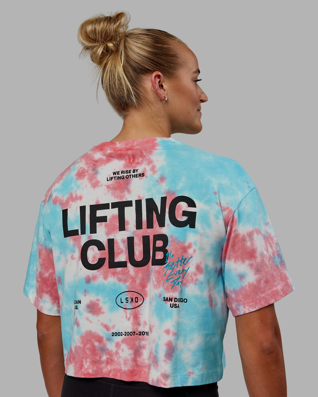 Woman wearing Lifting Club Cropped Heavyweight Tee - Scarlet-Tie Dye