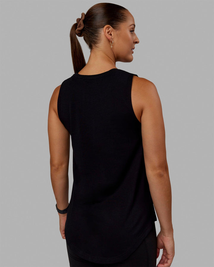 Woman wearing Luna FLXCotton Longline Tank - Black-Black