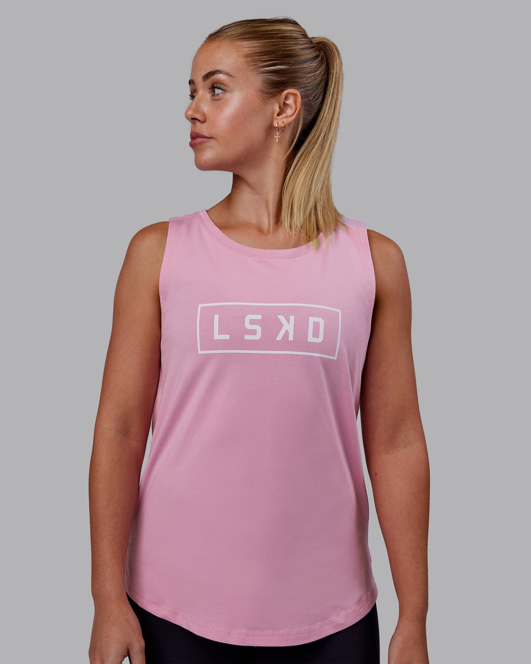 Woman wearing Luna FLXCotton Longline Tank - Bubblegum-White