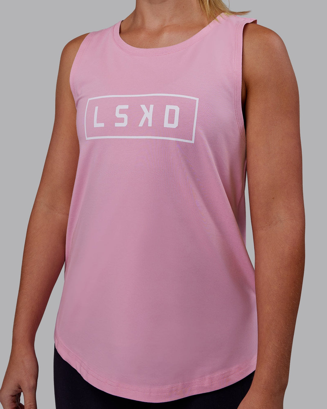 Woman wearing Luna FLXCotton Longline Tank - Bubblegum-White