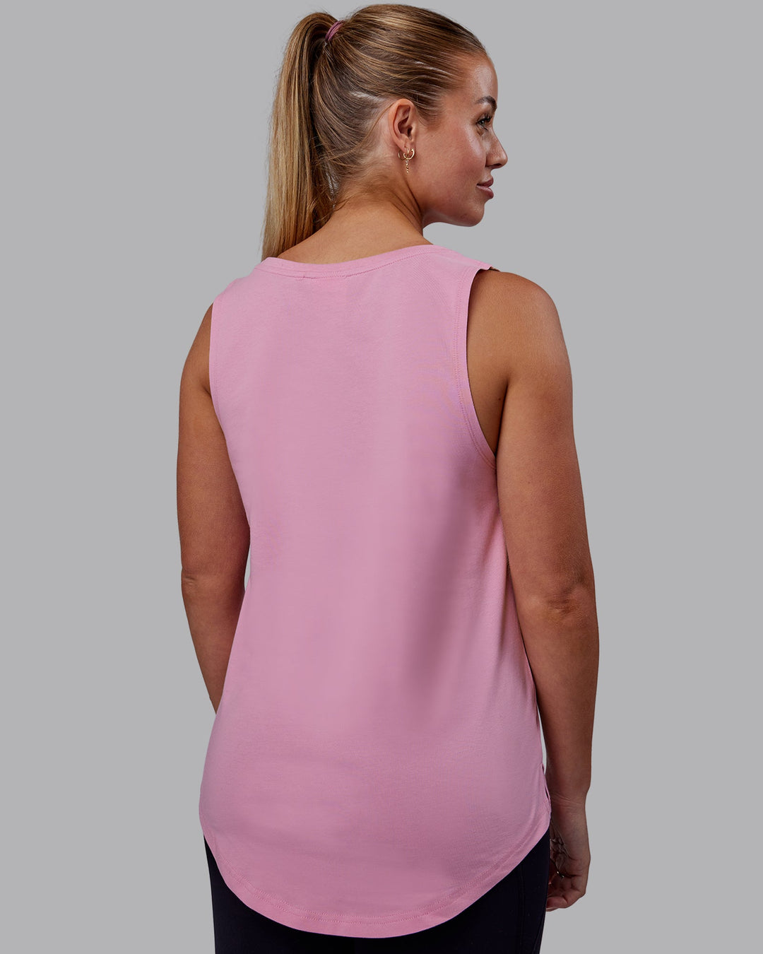 Woman wearing Luna FLXCotton Longline Tank - Bubblegum-White