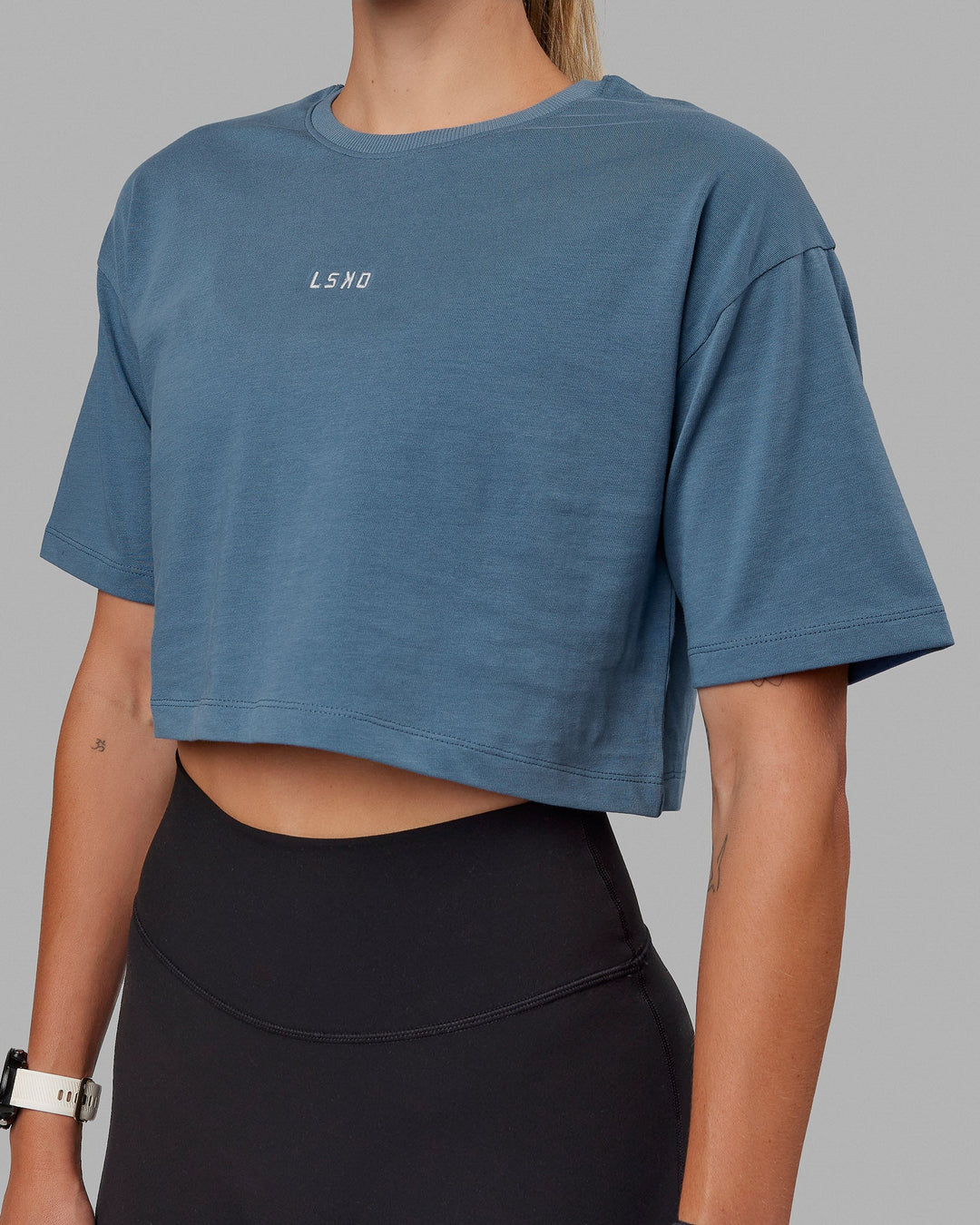 Woman wearing MVP Heavyweight Cropped Tee - Elemental Blue