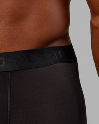 Man wearing MVP Trunks 3 Pack - Black