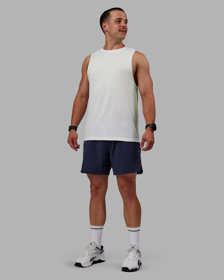 Man wearing AeroFLX+ Seamless Muscle Tank - Off White/Off White Marl
