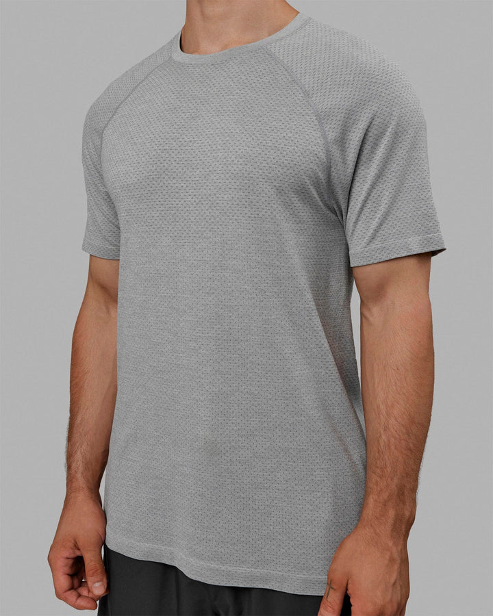 Man wearing AeroFLX+ Seamless Tee - Lt Grey Marl
