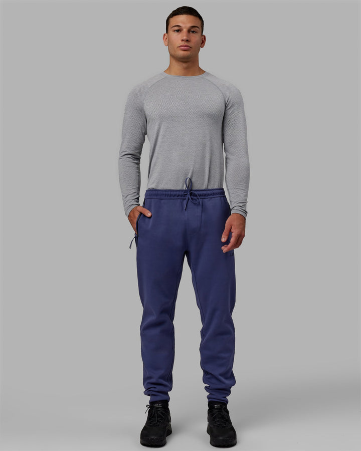 Man wearing Athlete ForgedFleece Zip Jogger - Future Dusk