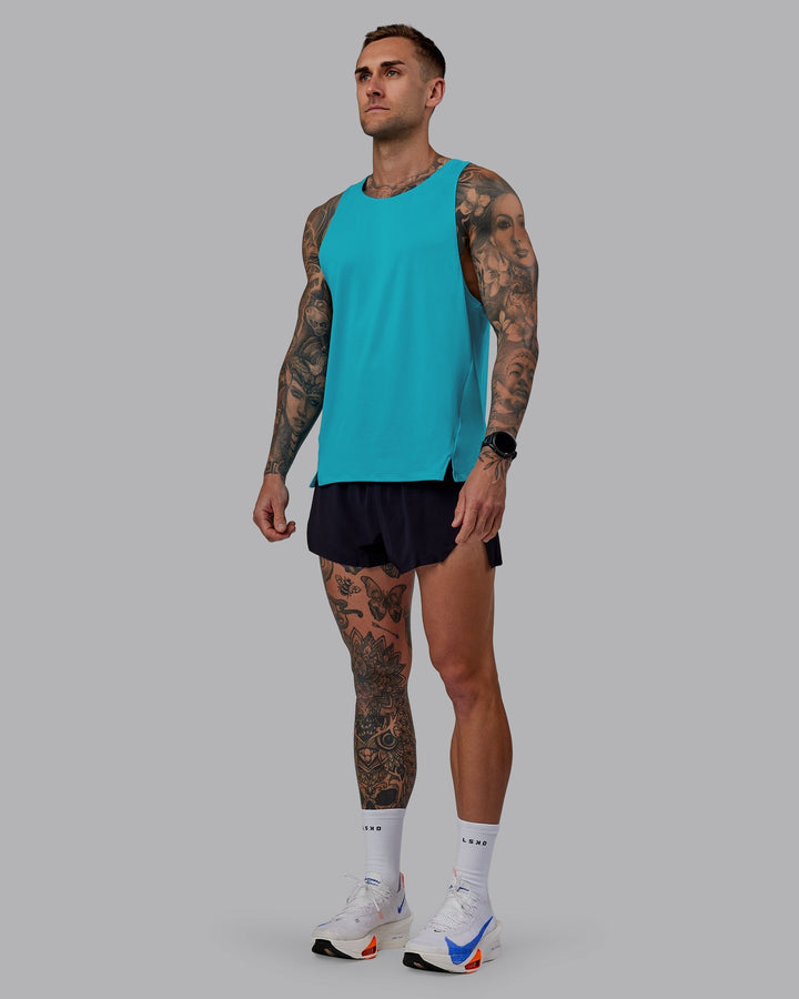 Man wearing Pace Running Tank - Blue Bird
