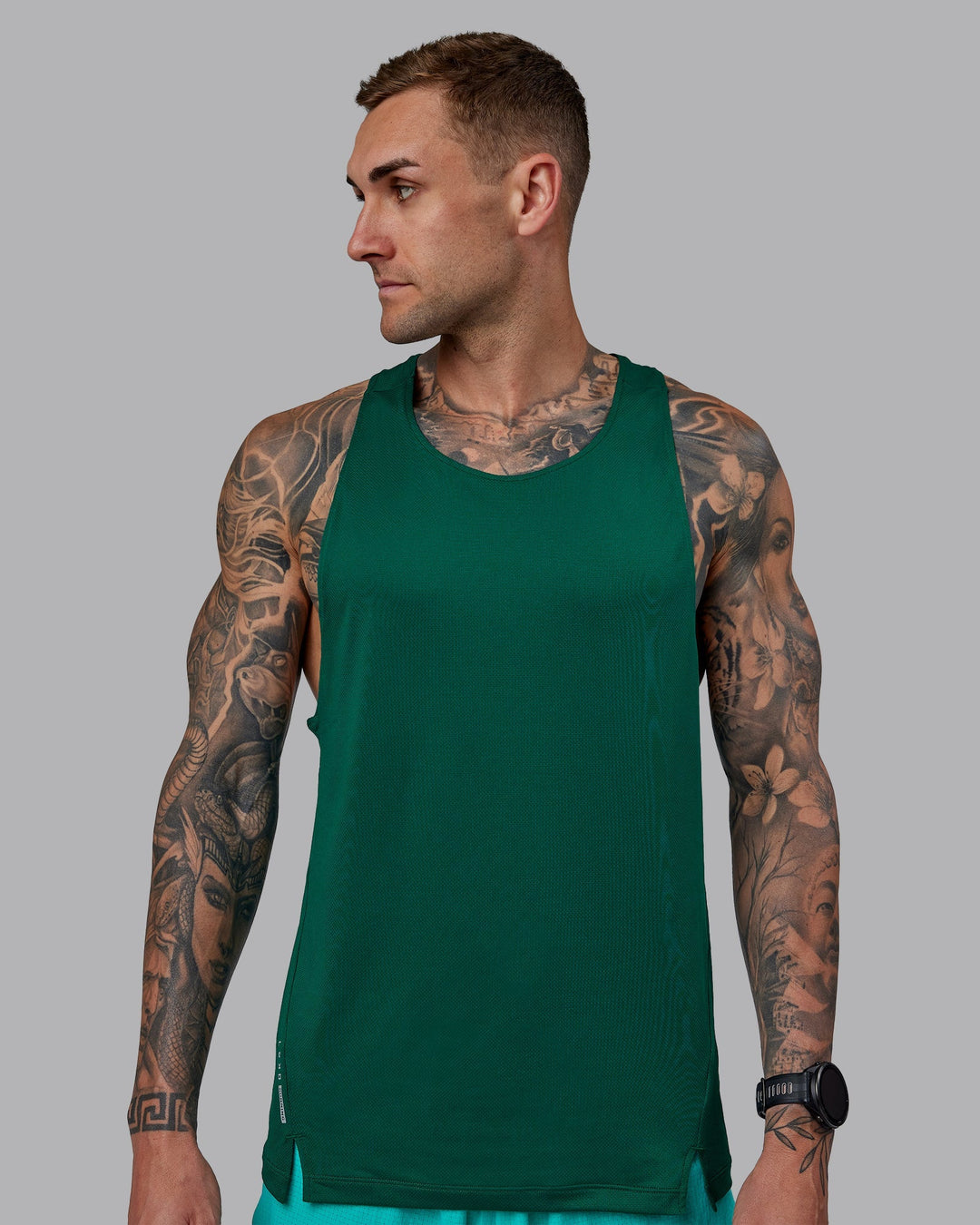 Man wearing Pace Running Tank - Malachite