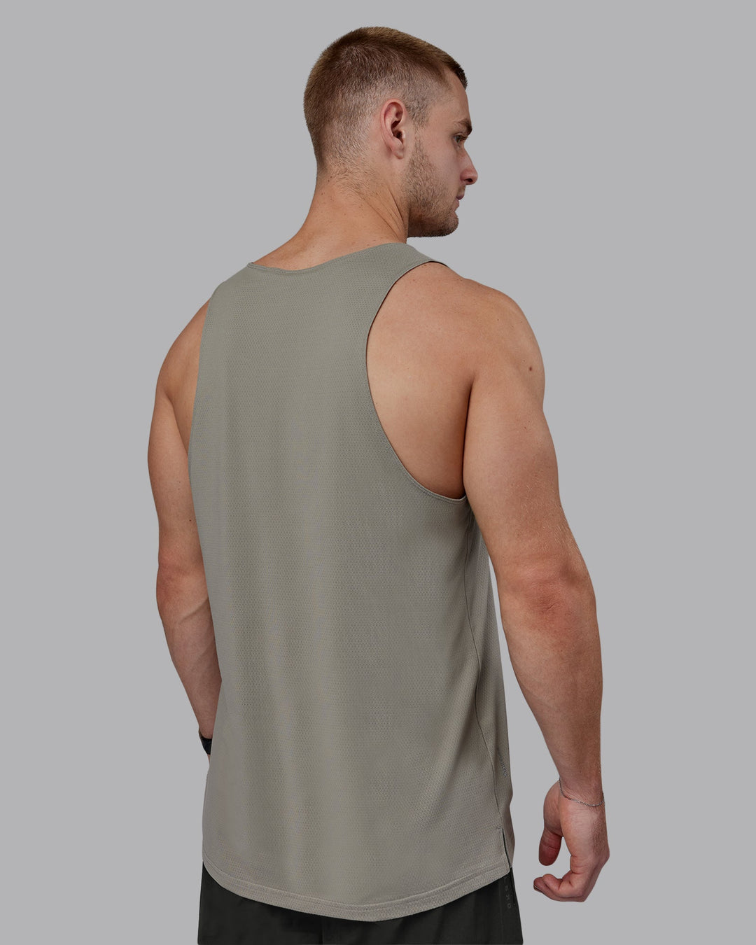 Man wearing Perform VapourFLX Tank - Elephant