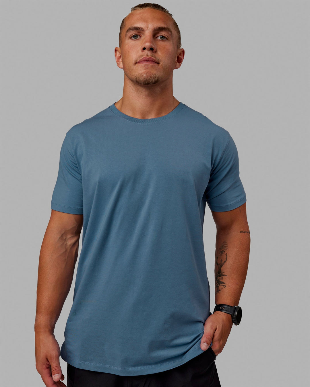 Man wearing PimaFLX Tee - Elemental Blue