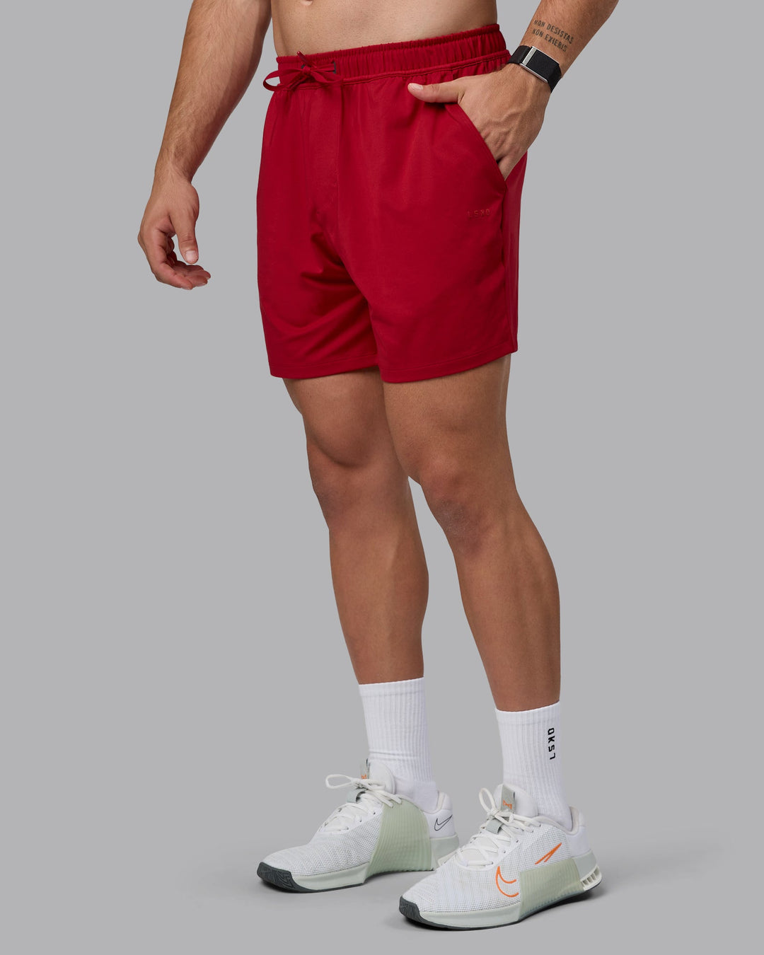 Man wearing Restore 6&quot; CloudFLX Shorts - Cherry Red