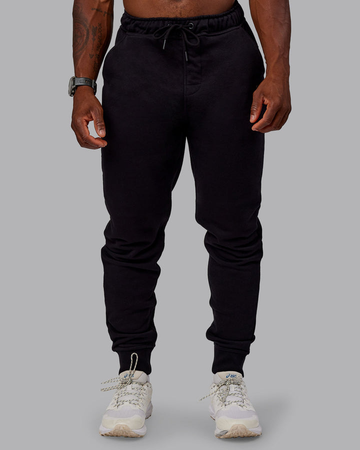 Man wearing Terry Track Pants - Black
