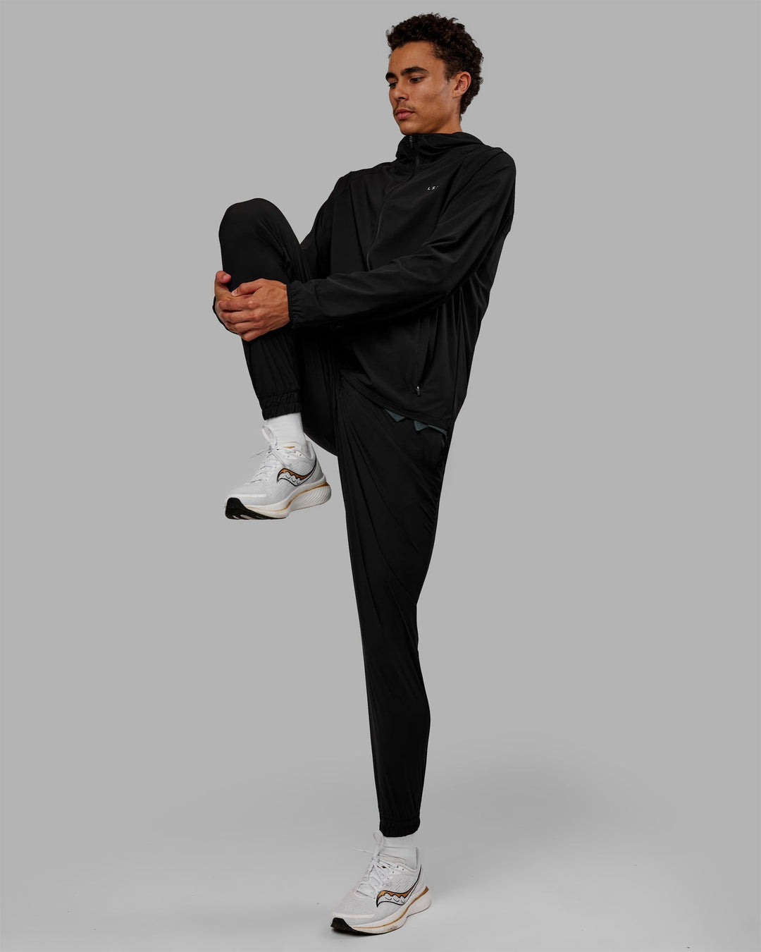 Man wearing Train-Lite FLXMAX Pants - Black