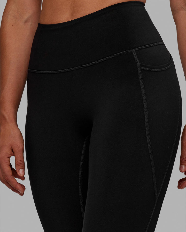 Woman wearing Motion Full Length Thermal Leggings - Black