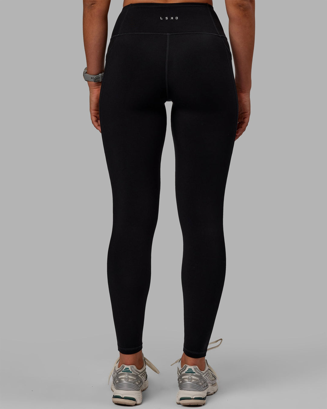 Woman wearing Motion Full Length Thermal Leggings - Black