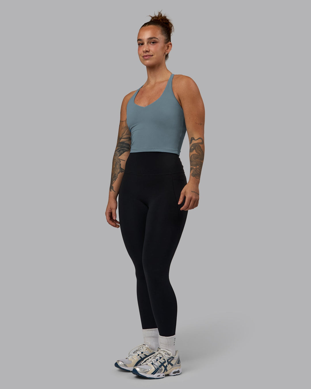 Woman wearing Movement Active Tank - Elemental Blue