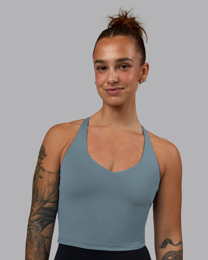 Woman wearing Movement Active Tank - Elemental Blue
