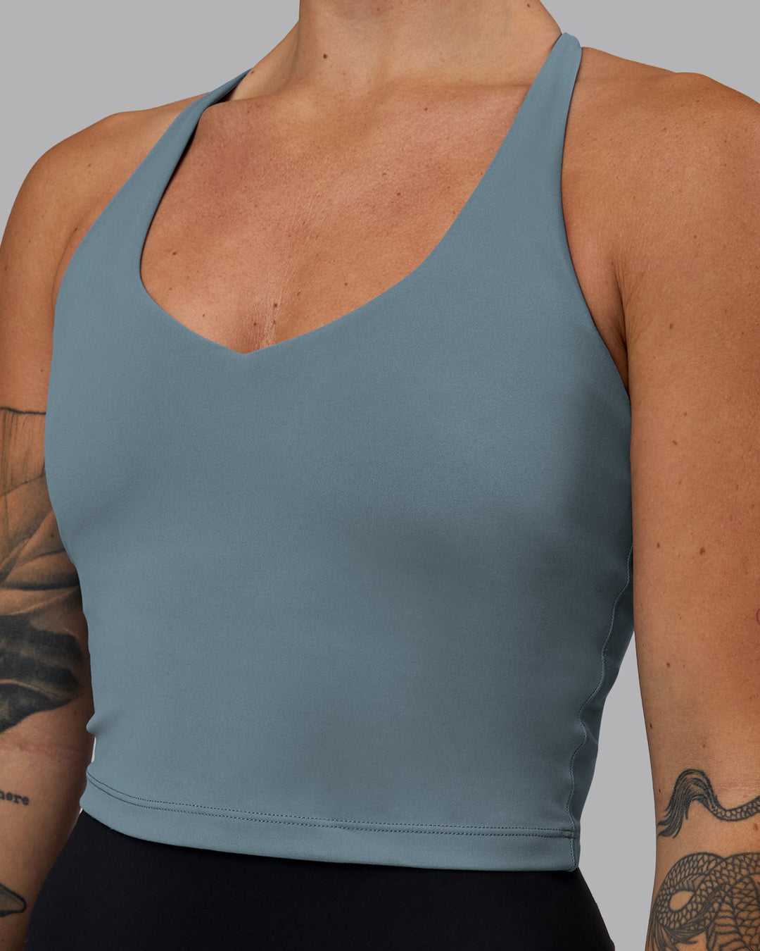 Woman wearing Movement Active Tank - Elemental Blue