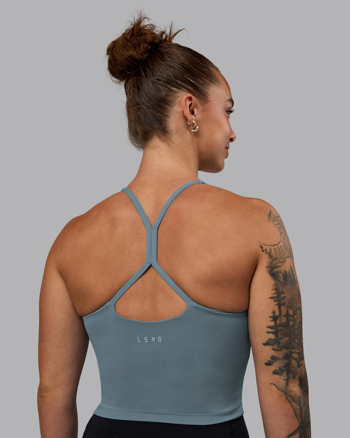 Woman wearing Movement Active Tank - Elemental Blue
