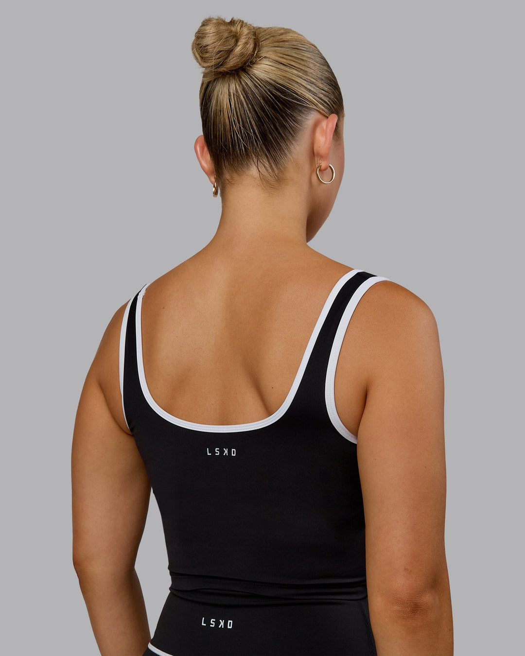 Woman wearing Nexus Active Tank - Black-White