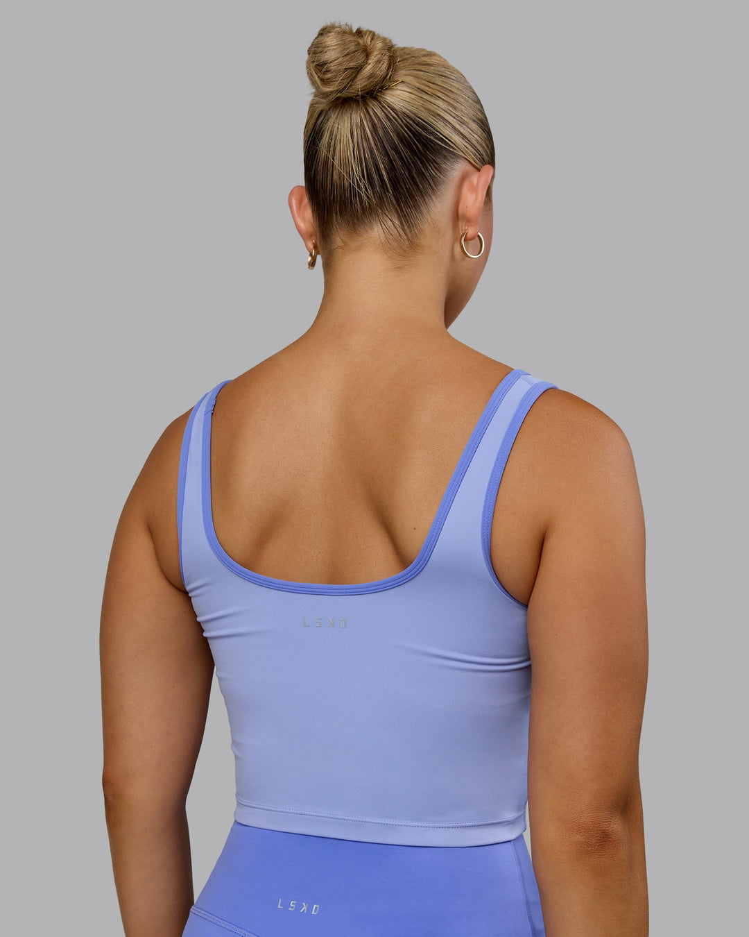 Woman wearing Nexus Active Tank - Light Indulgent Blue-Indulgent Blue