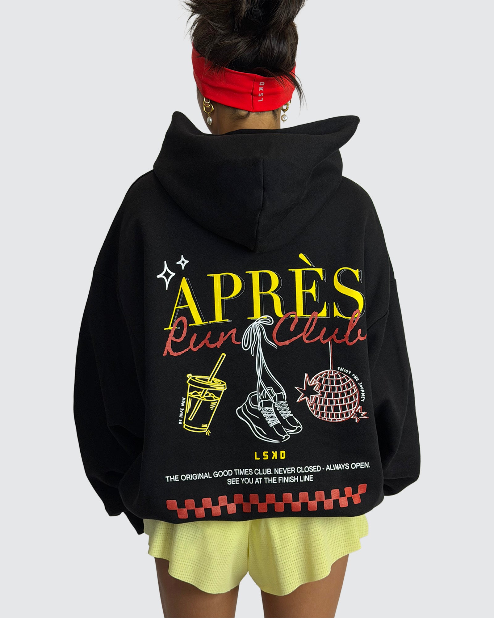 Woman wearing Oversized Apres Run Club MVP Hoodie - Black | Model:Meg | Size:XS