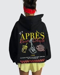 Woman wearing Oversized Apres Run Club MVP Hoodie - Black | Model:Meg | Size:XS