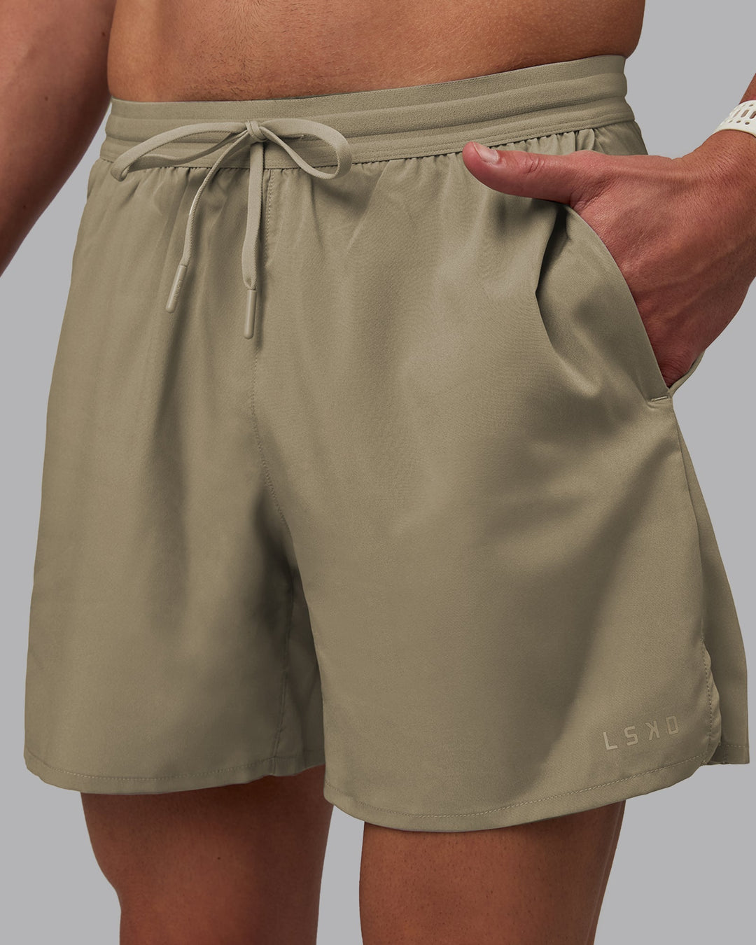 Man wearing Pace 5&quot; Lined Performance Shorts - Elephant