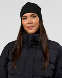 Woman wearing Pace Beanie in Black 
