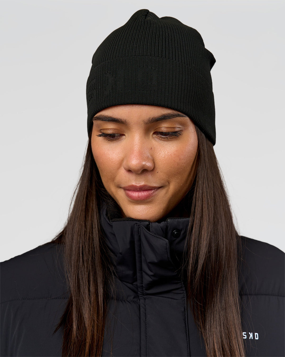 Woman wearing Pace Beanie in Black 