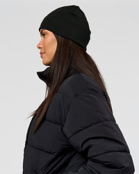 Woman wearing Pace Beanie in Black 