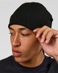 Man wearing Pace Beanie in Black 