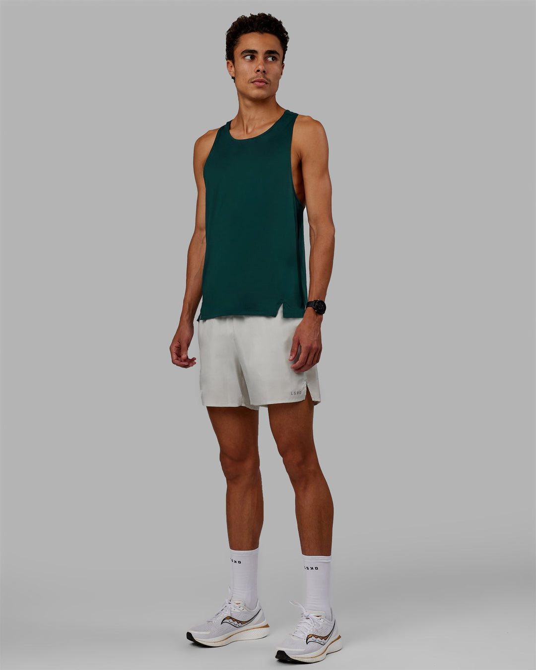 Man wearing Pace Running Tank - Dark Moss