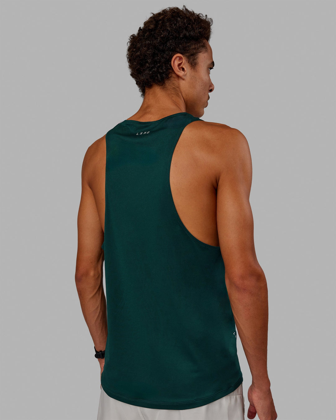 Man wearing Pace Running Tank - Dark Moss