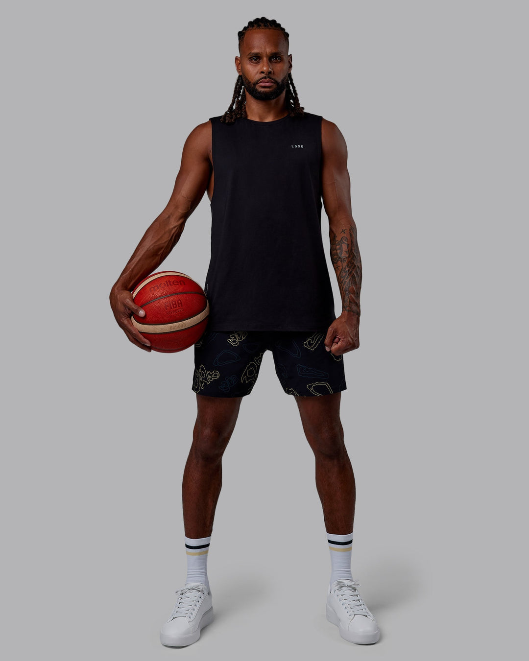 Man wearing Patty Mills Perform VapourFLX Muscle Tank - Black Reflective