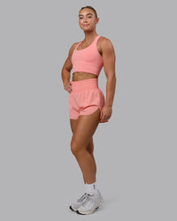 Woman wearing Power Train 2" Shorts - Murex Shell